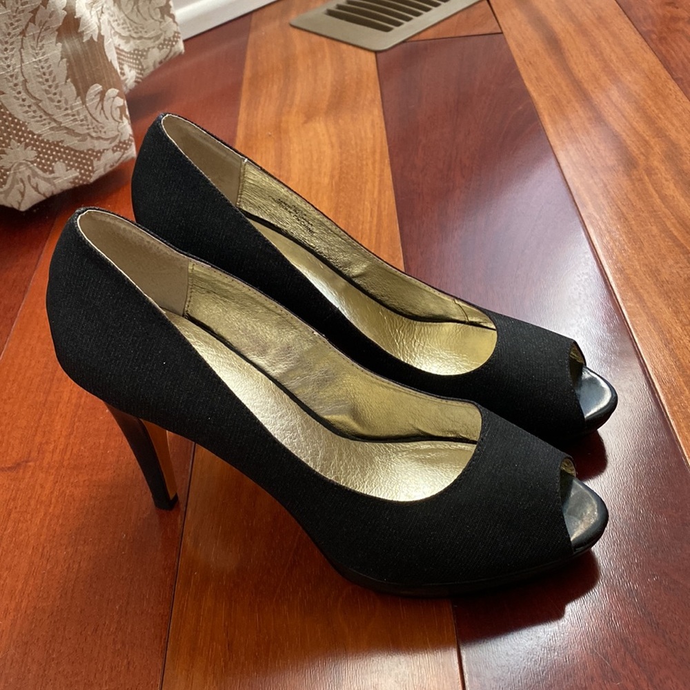 Elegant Brown’s black stilettos